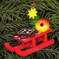 Roter Weihnachtsschlitten mit Lebkuchen Christbaumschmuck